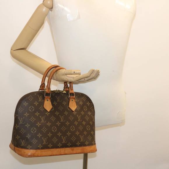 LOUIS VUITTON Alma Handbag - Picture 9 of 16